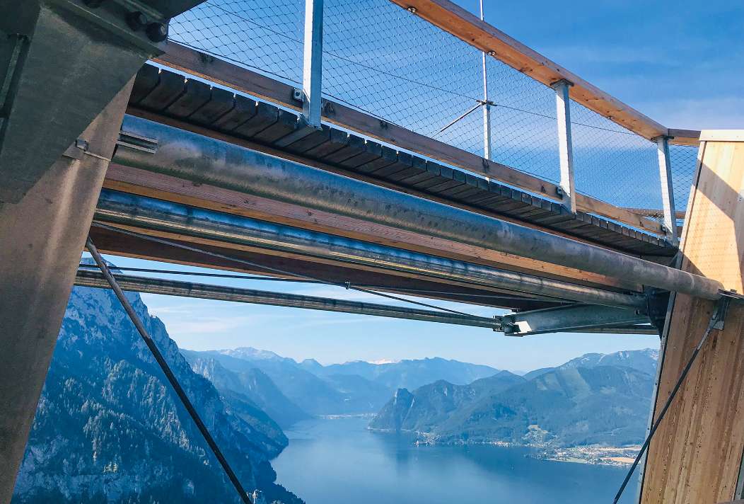 The wooden footbridge on the Grünberg provides a unique view of the foothills of the Alps in Upper Austria