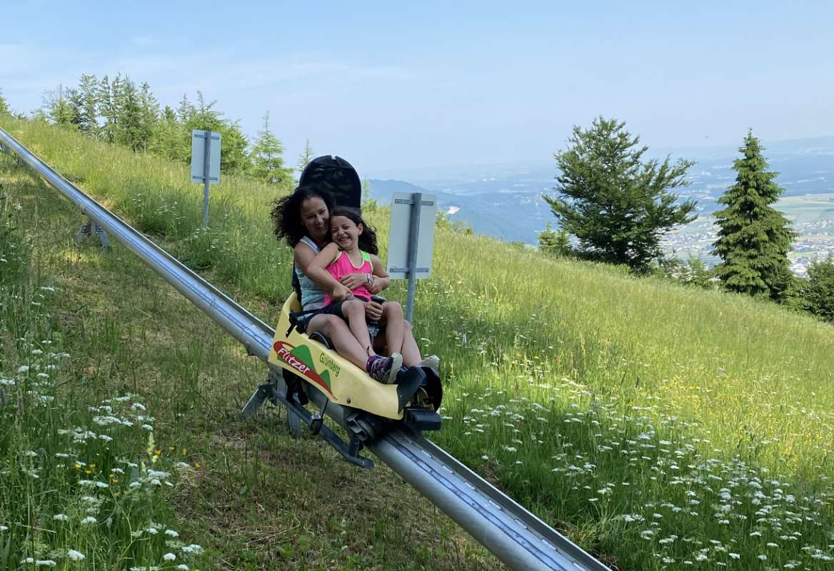 The summer toboggan run on the Grünberg provides fun and amusement for young and old alike.